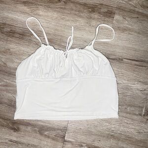 White aritzia Wilfred tank with ties- size L
Similar to the martine poplin top
